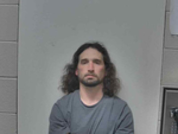 Mugshot of TANNER LANE HUGHES