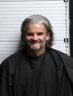 Mugshot of DAVID ADAM WOOLUM