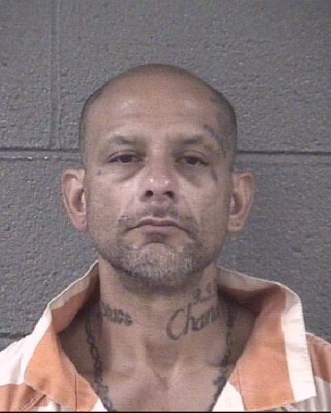 Mugshot of JOHN CARLOS FLORES