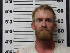 Mugshot of JUSTIN EDWARD THOMPSON