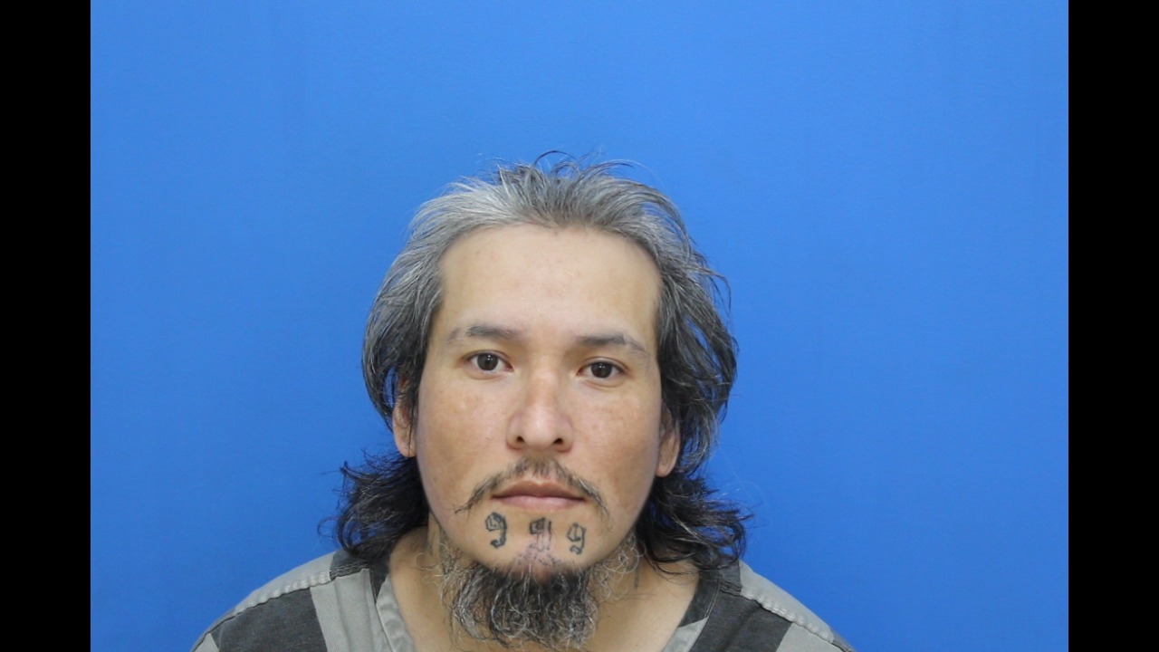 Mugshot of Mendoza G Gabino