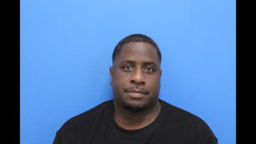 Mugshot of Jomokayatta Walter Dennis Cook