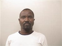 Mugshot of Samuel Garang Akau