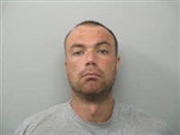 Mugshot of Travis Earl Pugh