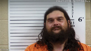 Mugshot of Travis Ryan Huskins