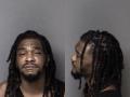 Mugshot of Desmoine Dangelio Shalatie Adams