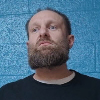 Mugshot of TRAVIS WAYNE ROBINSON