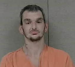 Mugshot of JUSTIN LEEDON BLOXSOM