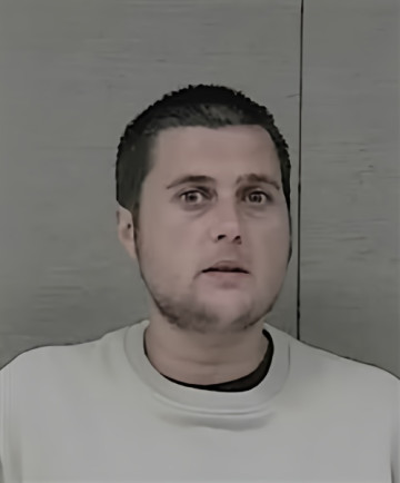 Mugshot of JUSTIN WADE EVANS