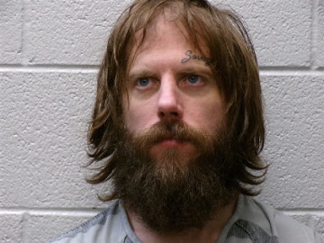 Mugshot of JUSTIN ONEIL SMITH