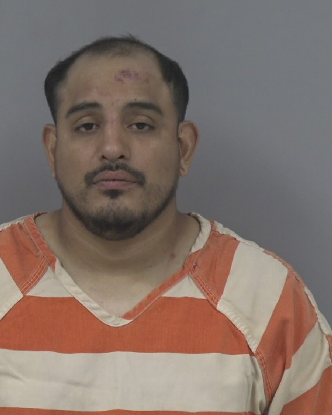 Mugshot of JOHN MONROY-PULIDO