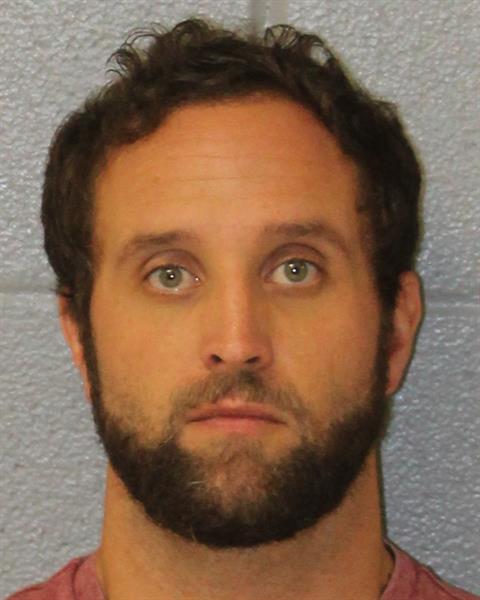 Mugshot of CORBEN BREWER