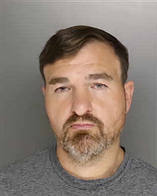 Mugshot of WILLIAM JUSTIN-BRYANT ROMERO