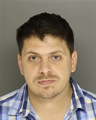 Mugshot of RYAN JON WHITCOME