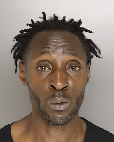Mugshot of REGGIE DEMOND REVELS