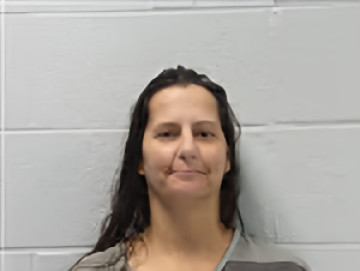 Mugshot of Kelly Howell Piguerra
