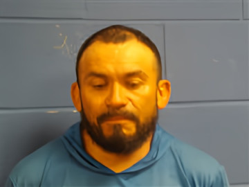 Mugshot of Angel Reyes-Flores