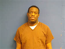 Mugshot of Alhaji Cadogan