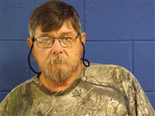 Mugshot of Henry Landon Tew