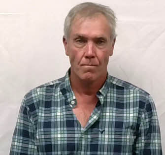 Mugshot of Leslie Eugene Neuhaus