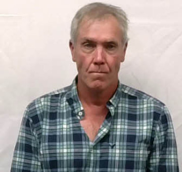 Mugshot of Leslie Eugene Neuhaus