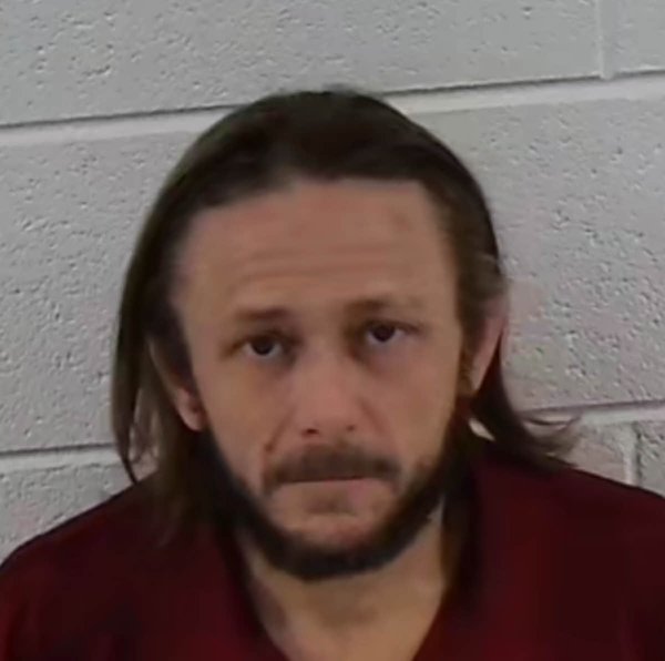 Mugshot of JUSTIN BRENT MONCUS