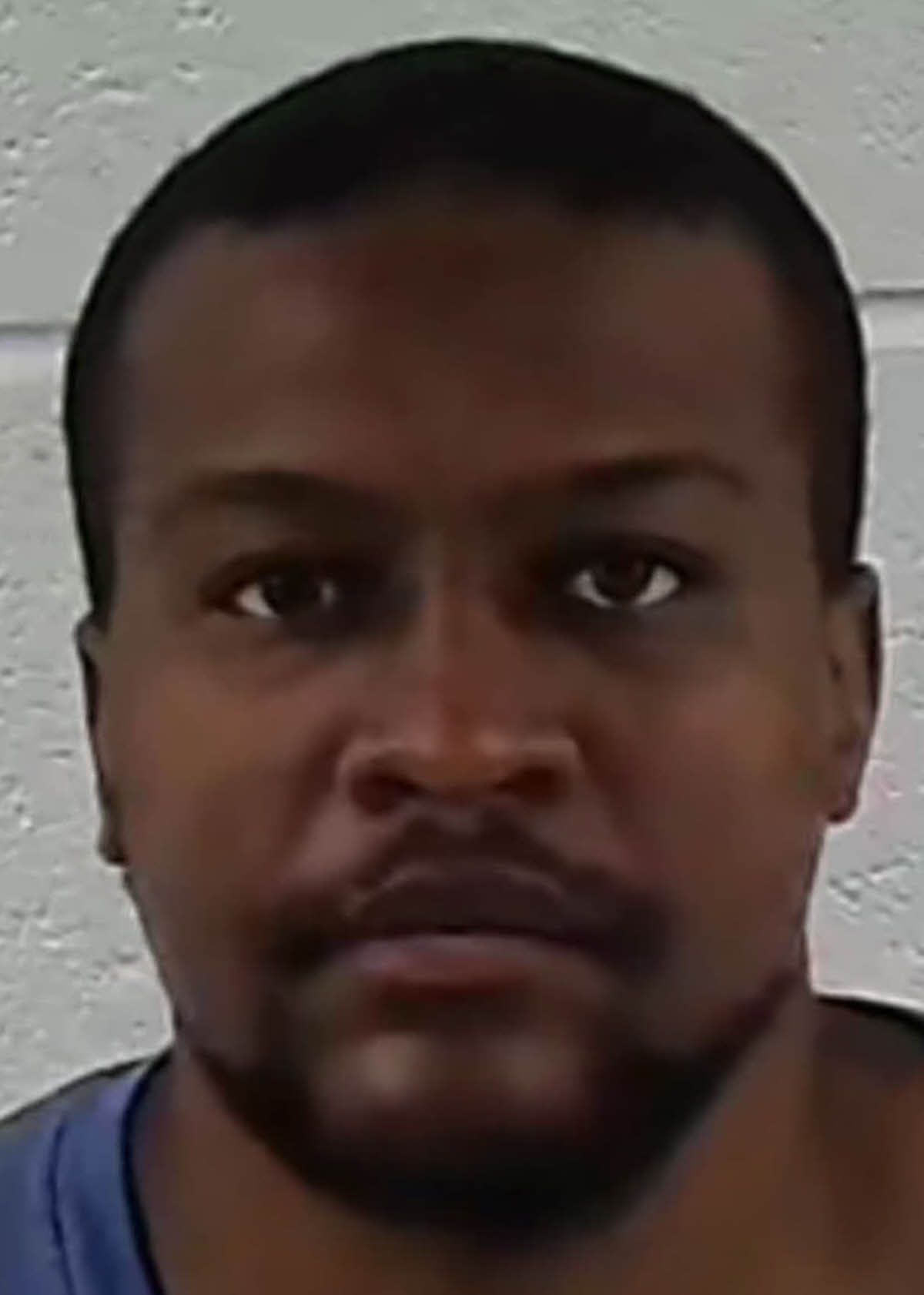 Mugshot of JUSTIN MATTHEW LEE BLUE