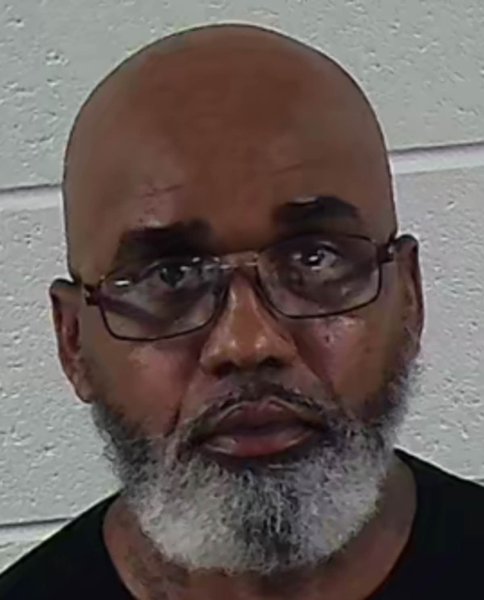 Mugshot of JOHN L REVELS