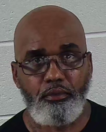 Mugshot of JOHN L REVELS
