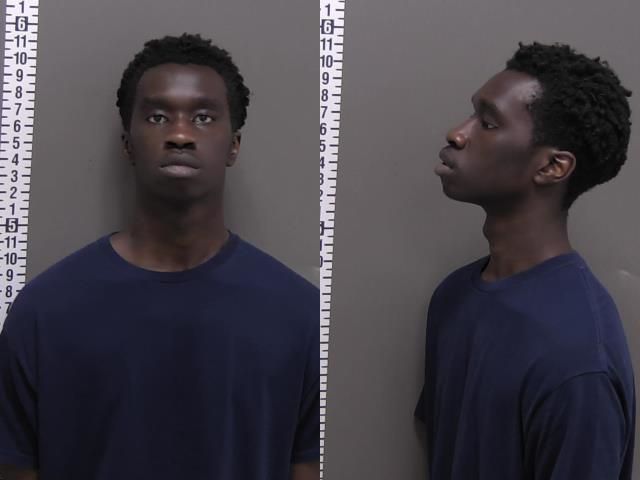 Mugshot of HENOK OKATAYOT FRANCIS