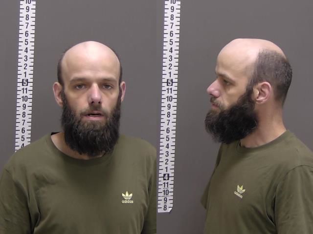 Mugshot of JUSTIN MICHAEL WOOD