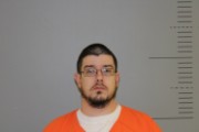 Mugshot of Aaron, Gustave Toth
