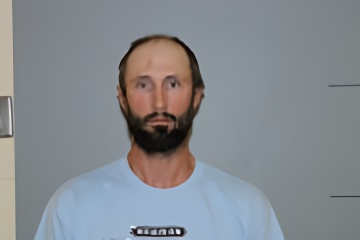 Mugshot of Leland, Thomas Schneider