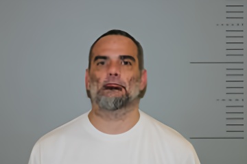 Mugshot of Clifford, Adams Deneault