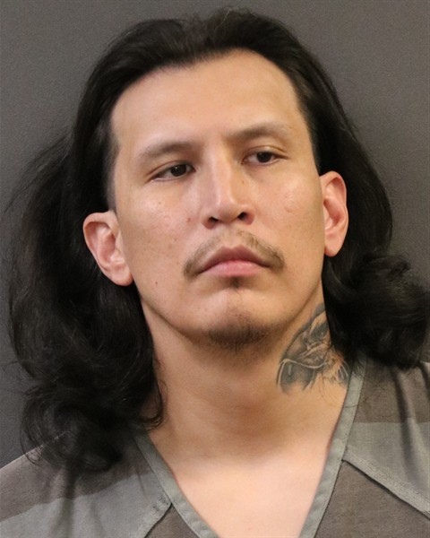 Mugshot of Claude Parker
