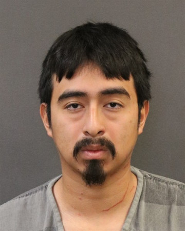 Mugshot of Esai E Santos Cotom