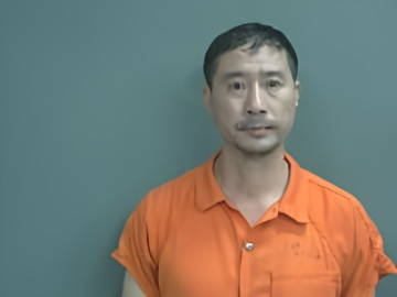 Mugshot of Qui Chen