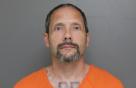Mugshot of WILLIAM e 30236047 HOWELL