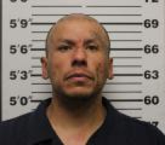 Mugshot of DELFINO III BARBOZA