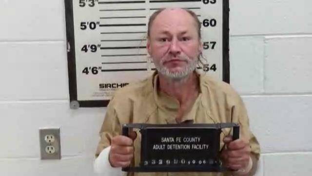 Mugshot of TRAVIS E GARRETT