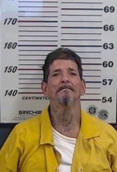 Mugshot of RUBEN R RAEL