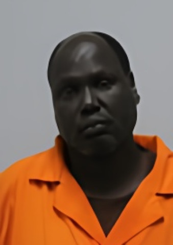 Mugshot of Daniel Deng Dau