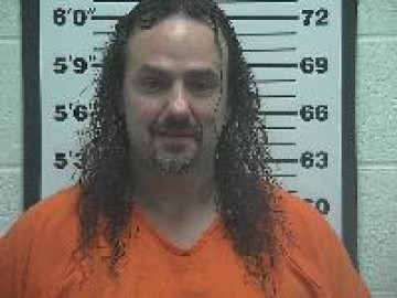 Mugshot of Amos Henry Moore