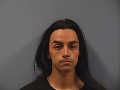 Mugshot of Alex Chucho Orta