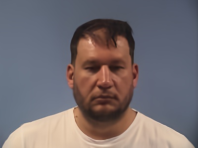 Mugshot of Piotr Kaczor
