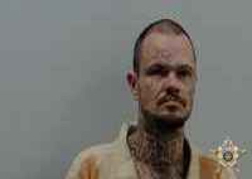 Mugshot of JUSTIN ALLEN HOPKINS
