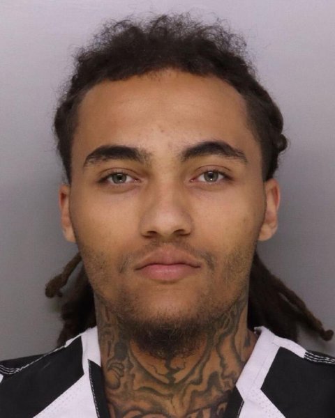 Mugshot of JUSTIN TORAN