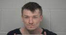 Mugshot of TRAVIS NEIL HOLLAR