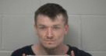 Mugshot of TRAVIS NEIL HOLLAR