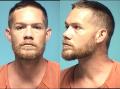 Mugshot of JUSTIN ELLIS